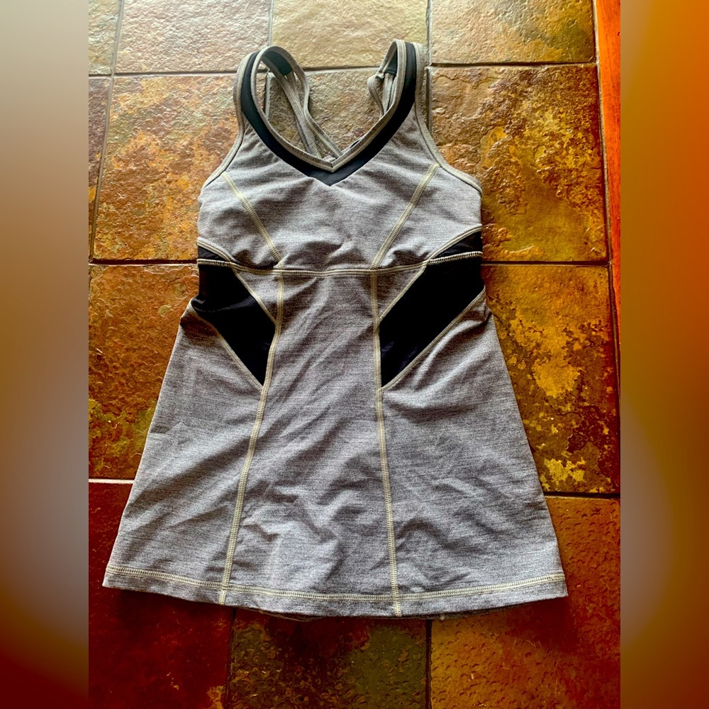 Like new Lululemon tank! Size 4. Cute strappy back.